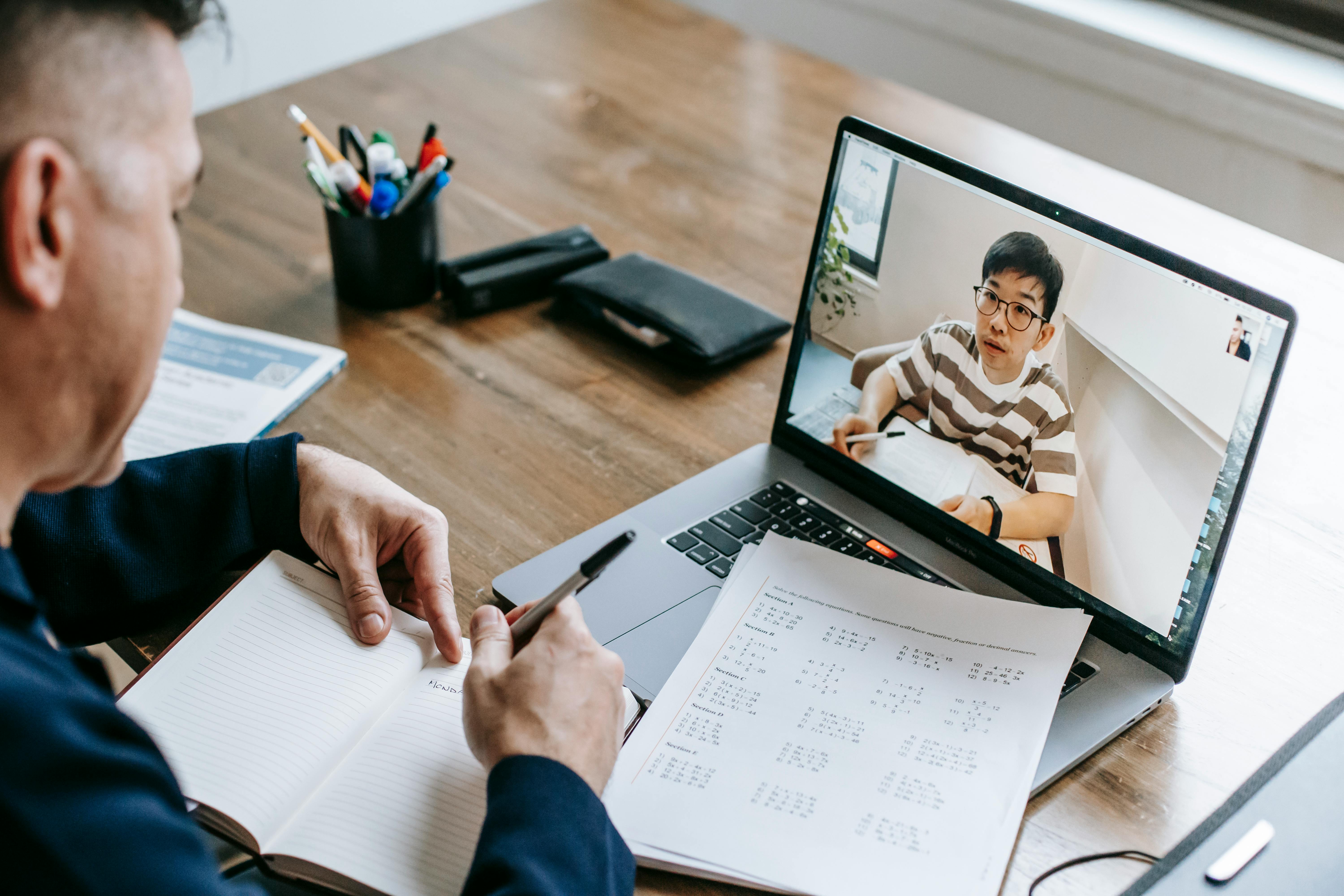 Tutor teaching student online